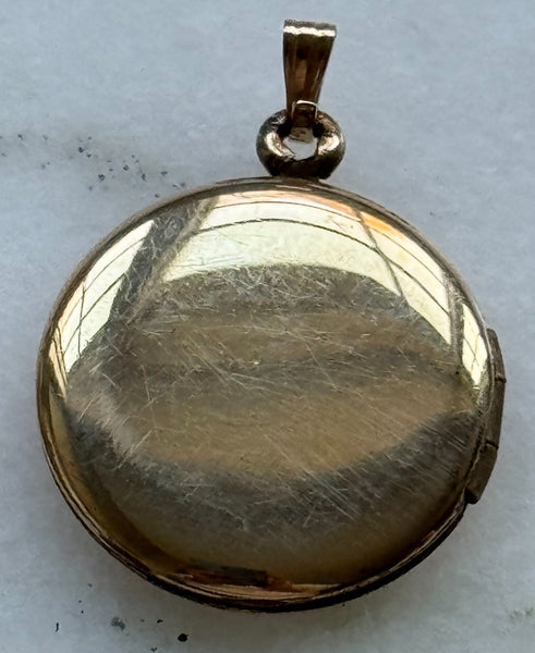 Round Floral and Delta Locket