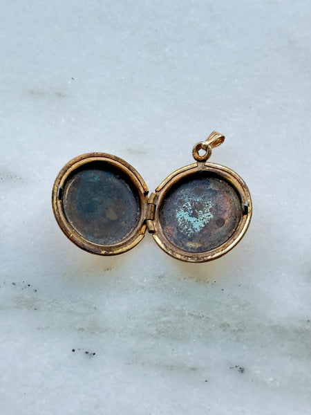 Round Floral and Delta Locket