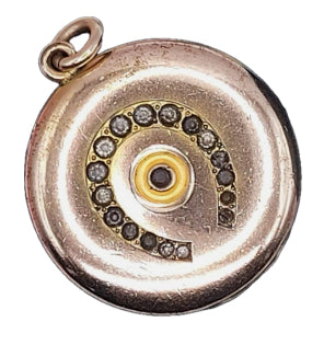 Horseshoe Locket with Evil Eye?